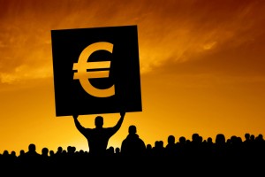 euro debt crisis protestors in silhouette with euro sign